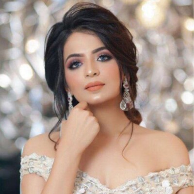 Beauty by Krimse provides artistic bridal looks Bride captured in an artistic black-and-white shot, emphasizing elegance.