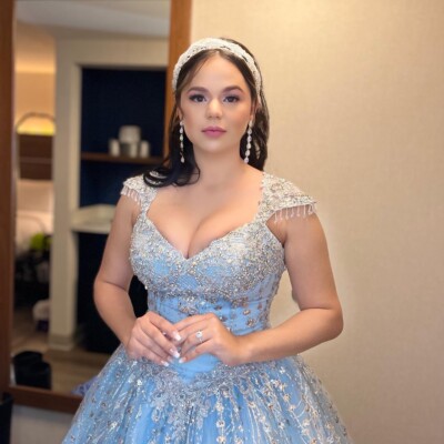 Beauty by Krimse creates bridal hairstyles with delicate Bridal hairstyle with intricate details and hair accessories.