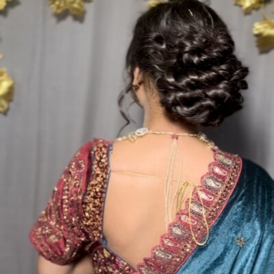 Beauty by Krimse offers luxurious and elegant bridal hairstyles that perfectly complement your wedding look. Luxurious bridal hairstyle with elegant details for a wedding look.