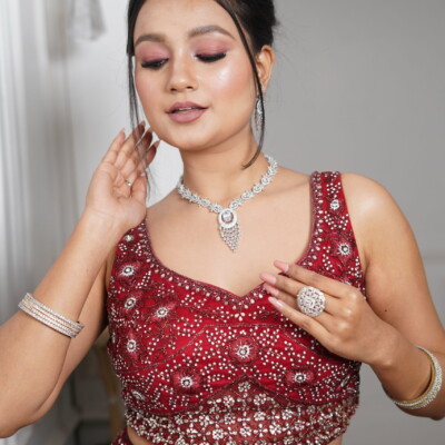 Enhance your formal occasions with a sleek semi-bridal hairstyle crafted by Beauty by Krimse. Semi-bridal hairstyle with a natural and sleek finish for formal occasions.