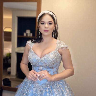 Beauty by Krimse delivers classic bridal looks with Bride with a chic updo and classic makeup look.