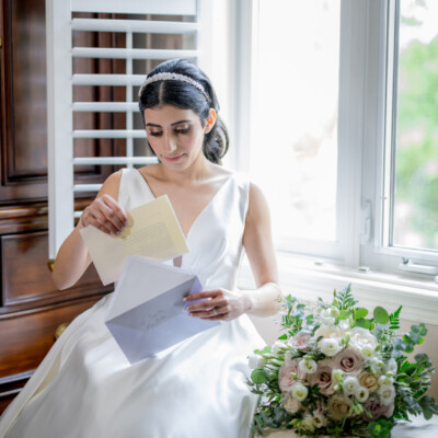 Enhance your bridal hairstyle with soft curls and beautiful accessories, Close-up of bridal hairstyle with soft curls and a decorative hair comb.